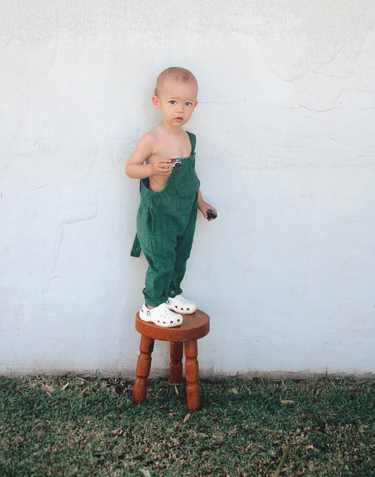 Green corduroy overalls